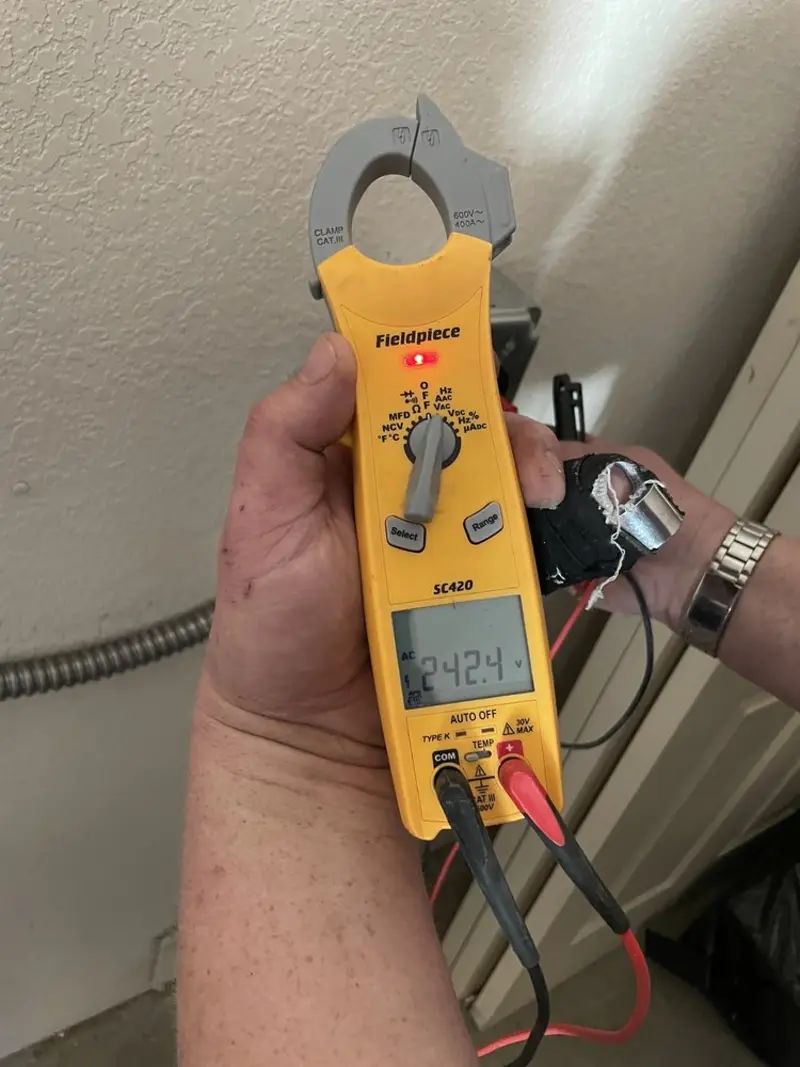 Voltage testing with clamp meter during Generator Installation in Dublin